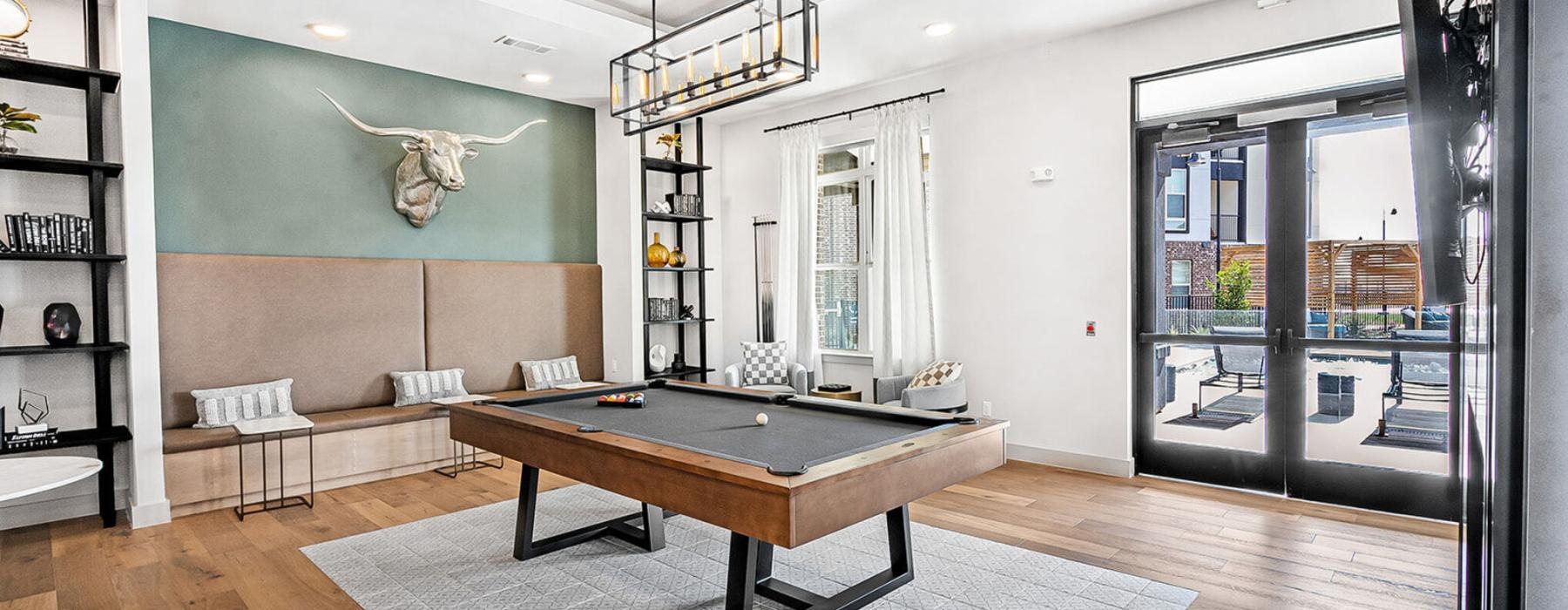 a room with a table and shelves