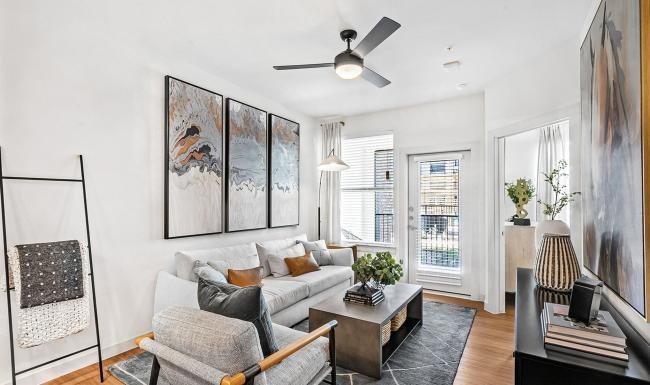 a living room with a couch and a table